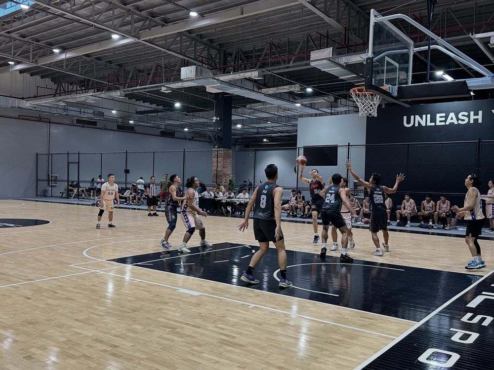 A full-court game underway on the 5v5 hardwood at Melmac Sports Imus