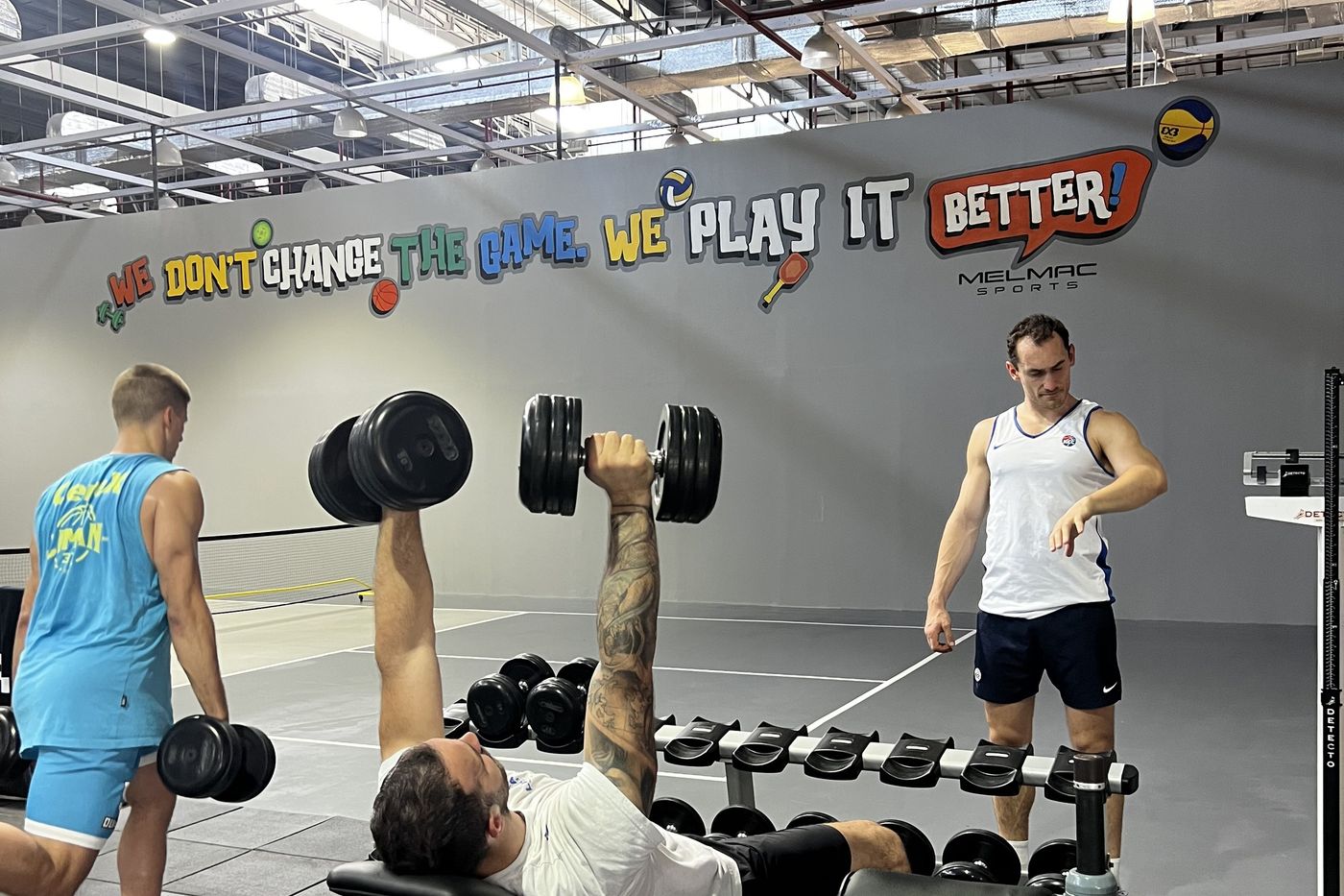 Members training in the strength and conditioning gym at Melmac Sports Imus
