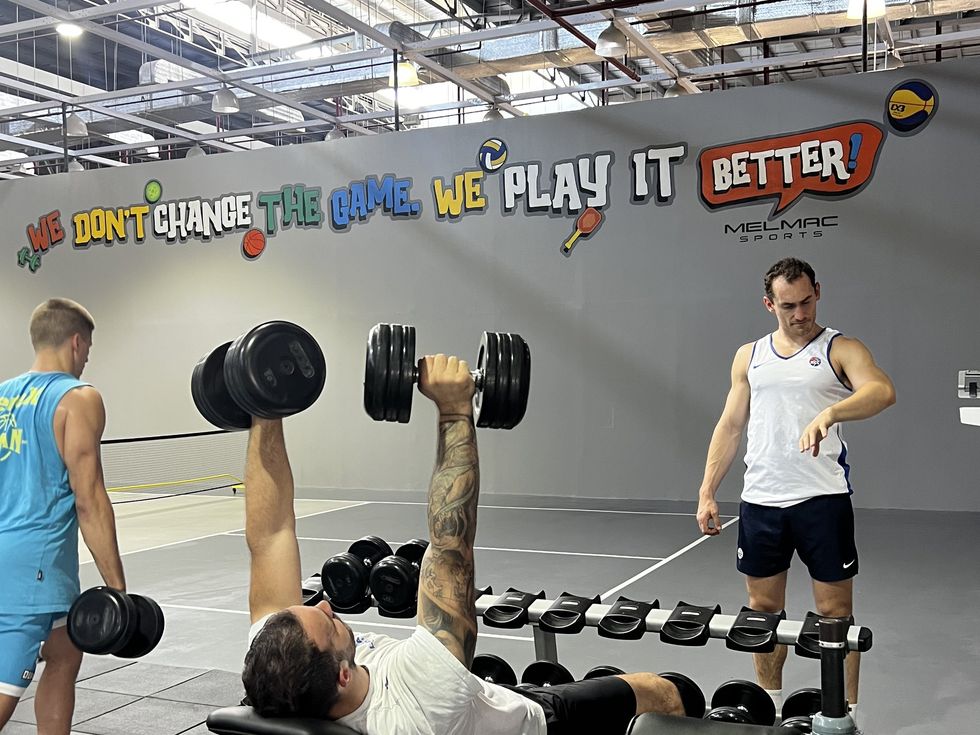 Members training in the strength and conditioning gym at Melmac Sports Imus