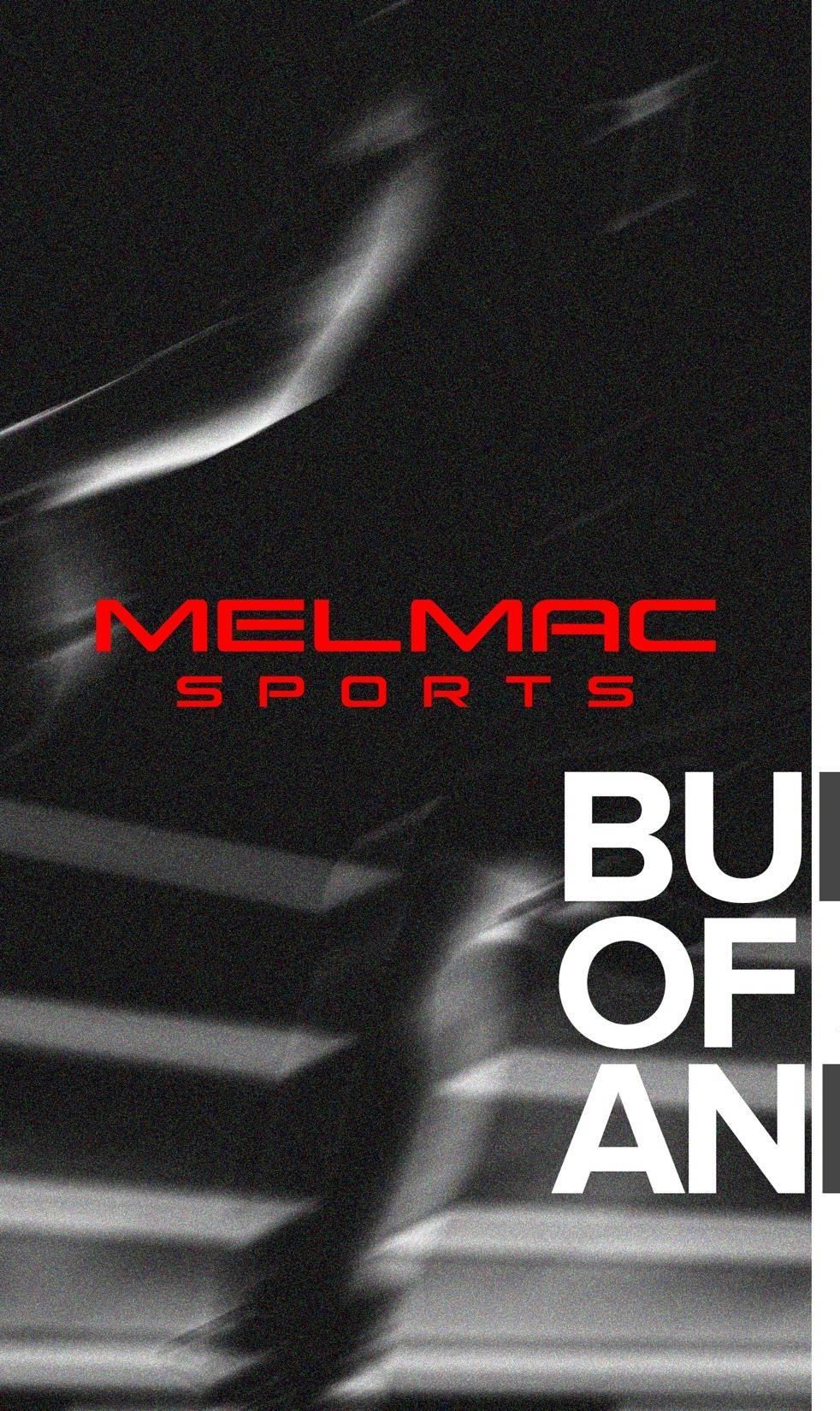 A motion-blurred night view of the Melmac Sports building