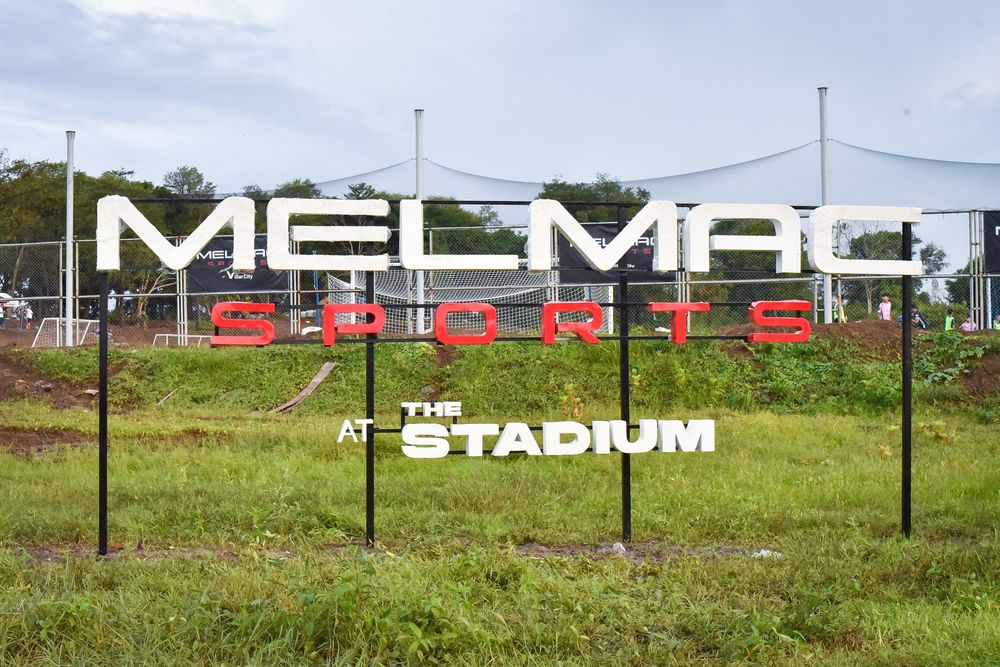 The Melmac Sports sign standing at the entrance to the Villar City grounds