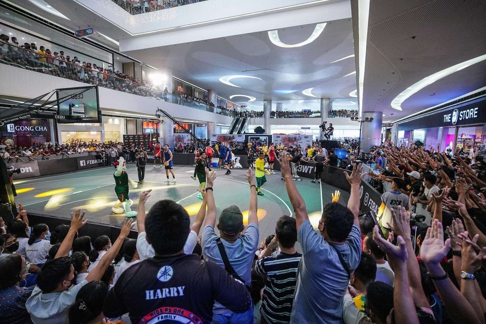 Spectators pressed around the court during a FIBA 3x3 World Tour game